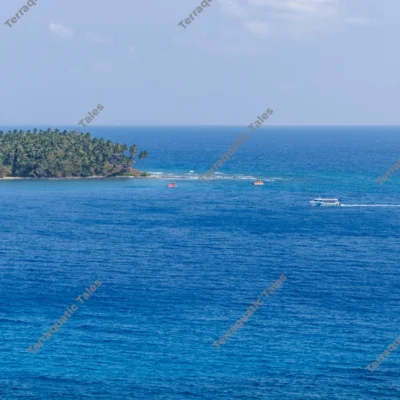 white-passenger-boat-cruising-the-deep-blue-andaman-sea-near-tropical-island