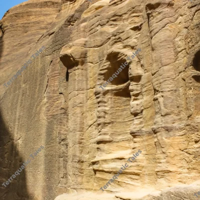 carved-rock-niches-sandstone-cliffs