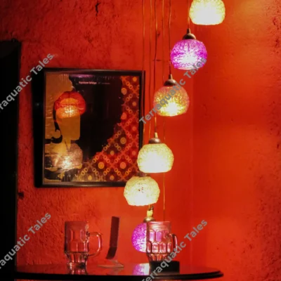 glass-lamps-cascading-red-room