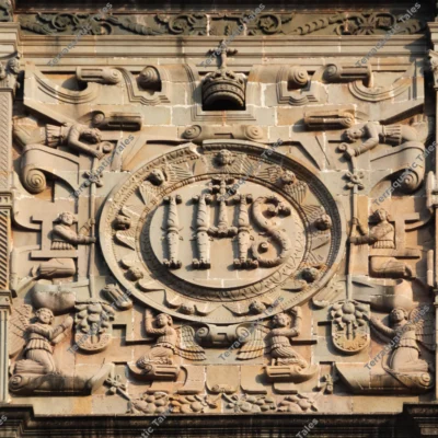 ihs-emblem-relief-carving